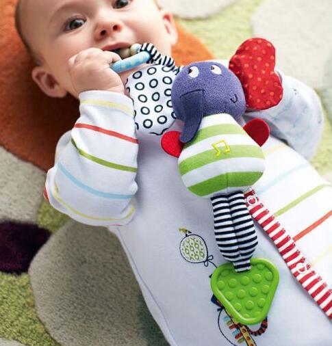 Discover the Joy of Playtime with the Musical Elephant Lathe Trailer Hanging Teether Baby Toys